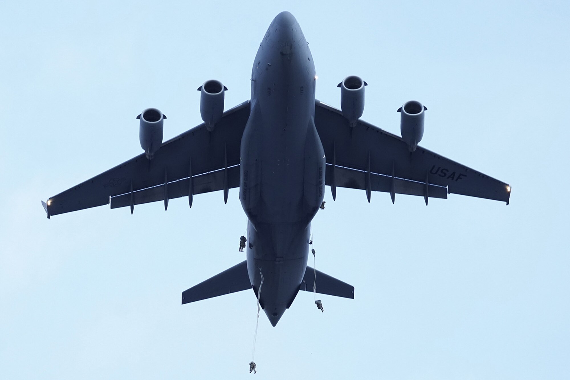 Paratroopers assigned to the 4th Infantry Brigade Combat Team (Airborne), 25th Infantry Division, U.S. Army Alaska, conduct a parachute jump on Malemute drop zone at Joint Base Elmendorf-Richardson, Alaska, Dec. 11, 2019. The Soldiers are part of the Army’s only Pacific airborne brigade with the ability to rapidly deploy worldwide, and are trained to conduct military operations in austere conditions.