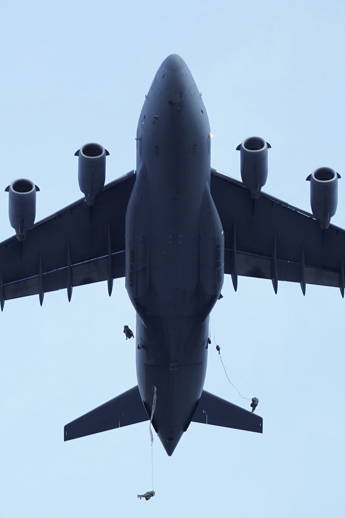 Paratroopers assigned to the 4th Infantry Brigade Combat Team (Airborne), 25th Infantry Division, U.S. Army Alaska, conduct a parachute jump on Malemute drop zone at Joint Base Elmendorf-Richardson, Alaska, Dec. 11, 2019. The Soldiers are part of the Army’s only Pacific airborne brigade with the ability to rapidly deploy worldwide, and are trained to conduct military operations in austere conditions.