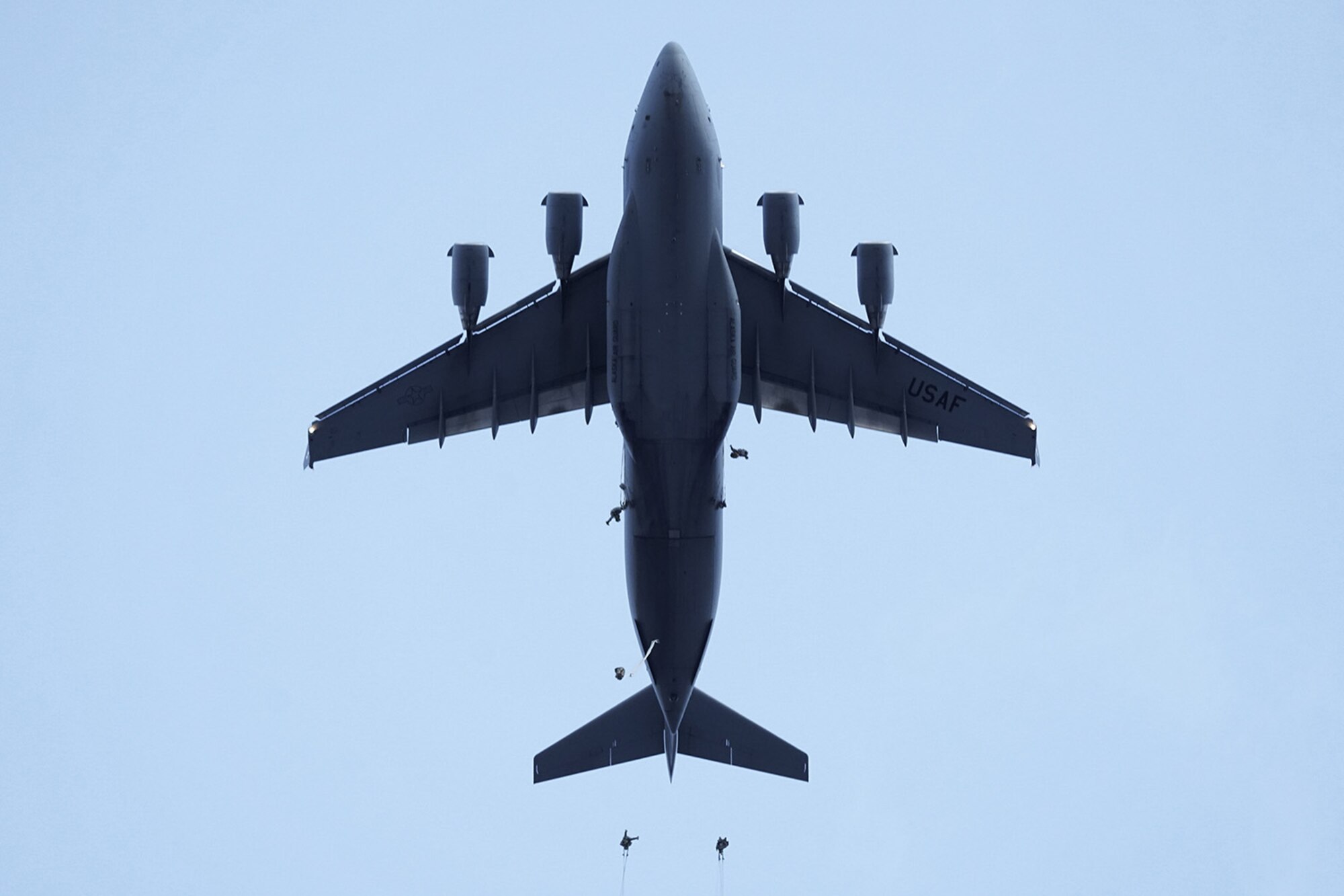 Paratroopers assigned to the 4th Infantry Brigade Combat Team (Airborne), 25th Infantry Division, U.S. Army Alaska, conduct a parachute jump on Malemute drop zone at Joint Base Elmendorf-Richardson, Alaska, Dec. 11, 2019. The Soldiers are part of the Army’s only Pacific airborne brigade with the ability to rapidly deploy worldwide, and are trained to conduct military operations in austere conditions.