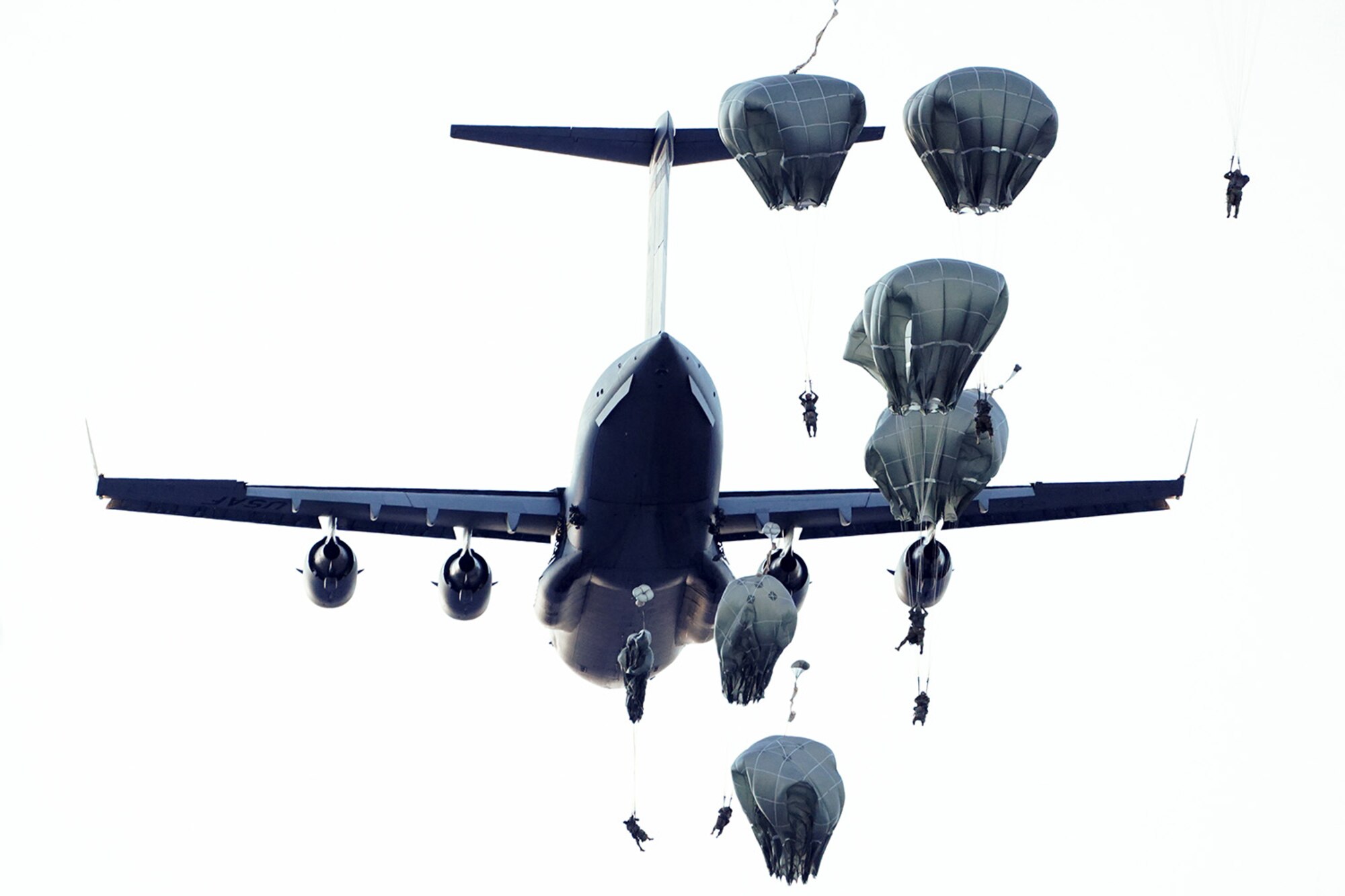 Paratroopers assigned to the 4th Infantry Brigade Combat Team (Airborne), 25th Infantry Division, U.S. Army Alaska, conduct a parachute jump on Malemute drop zone at Joint Base Elmendorf-Richardson, Alaska, Dec. 11, 2019. The Soldiers are part of the Army’s only Pacific airborne brigade with the ability to rapidly deploy worldwide, and are trained to conduct military operations in austere conditions.