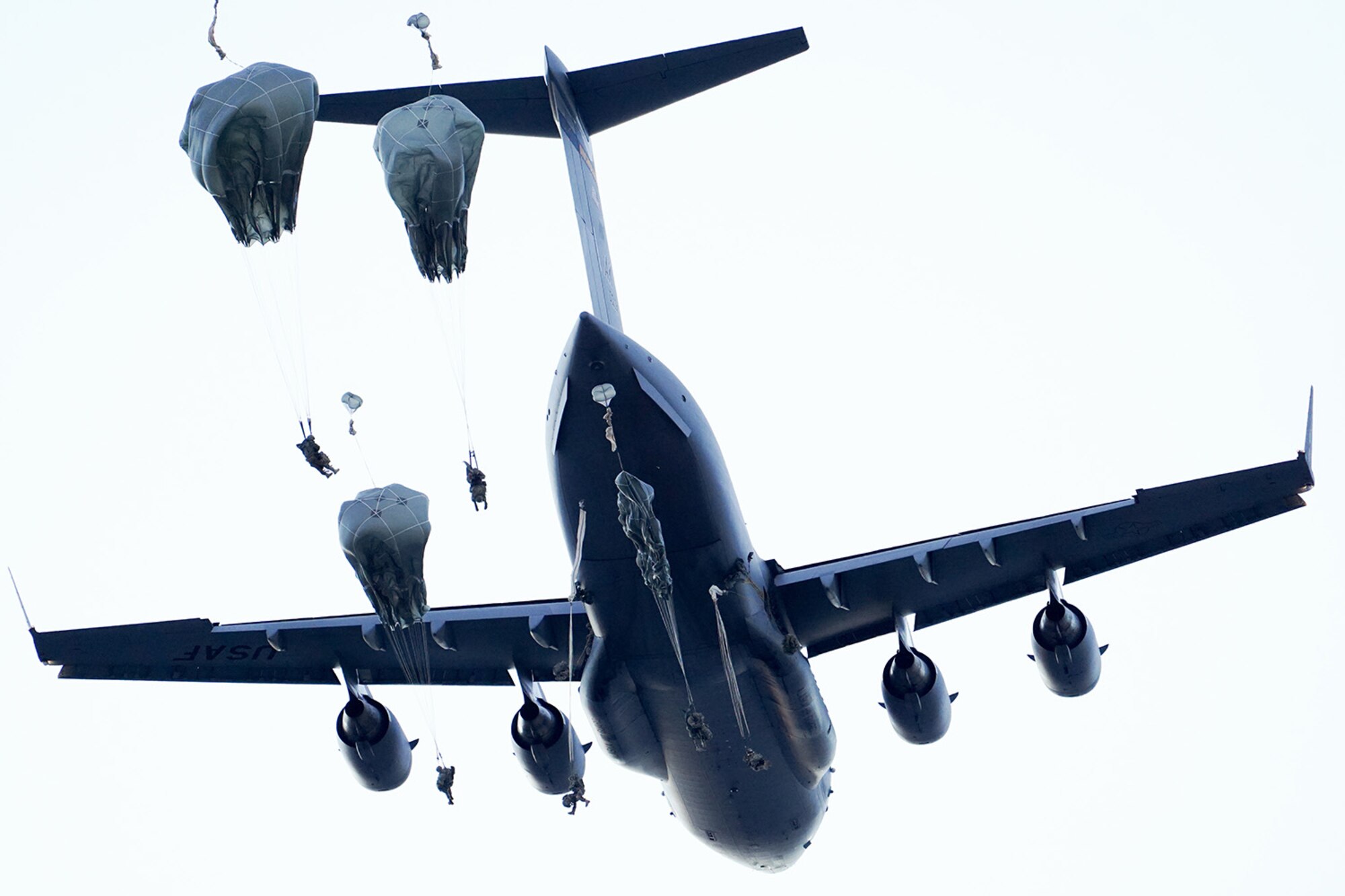 Paratroopers assigned to the 4th Infantry Brigade Combat Team (Airborne), 25th Infantry Division, U.S. Army Alaska, conduct a parachute jump on Malemute drop zone at Joint Base Elmendorf-Richardson, Alaska, Dec. 11, 2019. The Soldiers are part of the Army’s only Pacific airborne brigade with the ability to rapidly deploy worldwide, and are trained to conduct military operations in austere conditions.