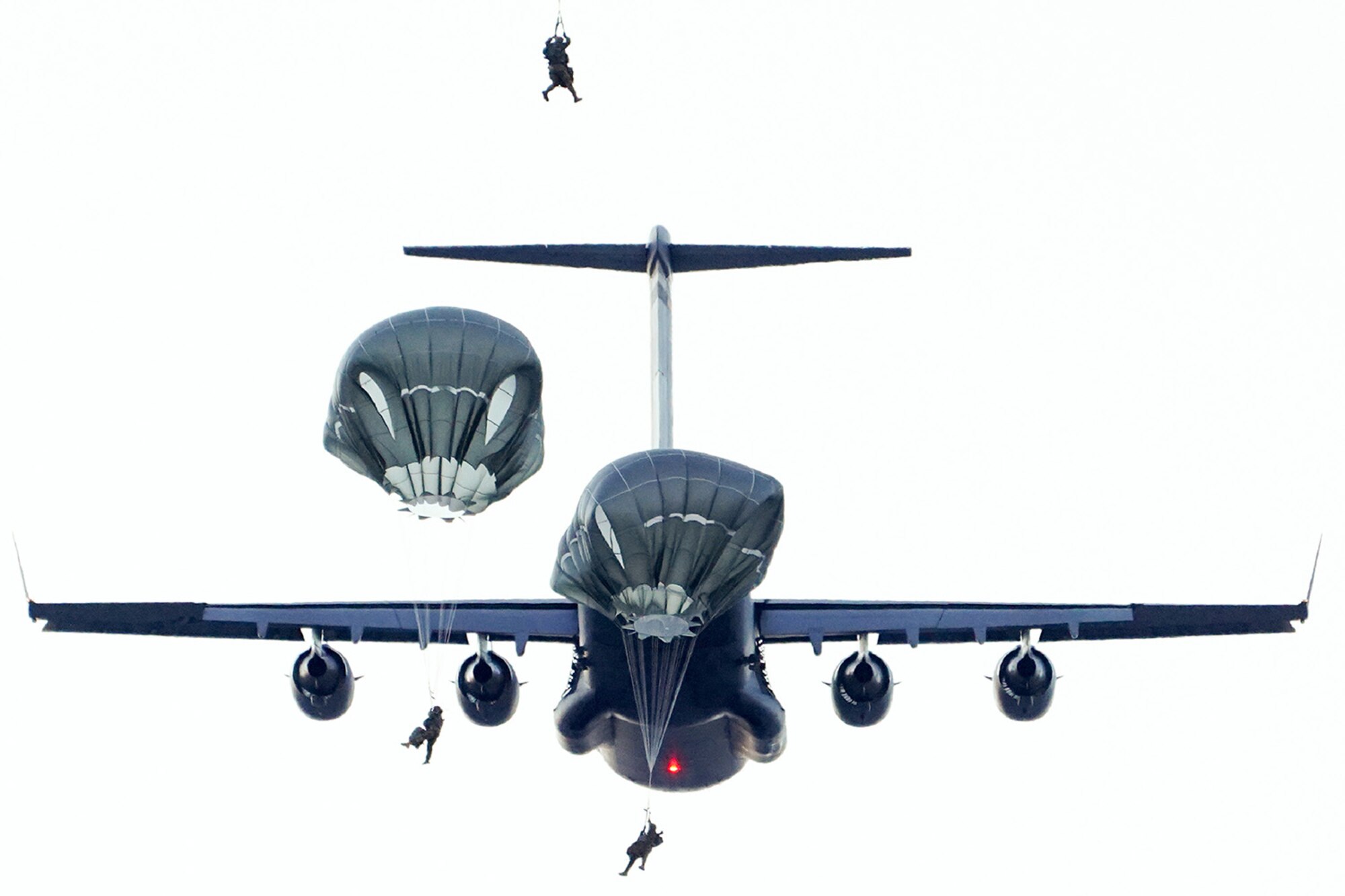 Paratroopers assigned to the 4th Infantry Brigade Combat Team (Airborne), 25th Infantry Division, U.S. Army Alaska, conduct a parachute jump on Malemute drop zone at Joint Base Elmendorf-Richardson, Alaska, Dec. 11, 2019. The Soldiers are part of the Army’s only Pacific airborne brigade with the ability to rapidly deploy worldwide, and are trained to conduct military operations in austere conditions.