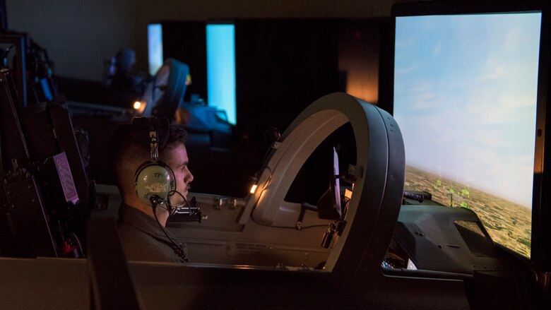 An Euro-NATO Joint Jet Pilot Training Program student pilot uses a training simulator at Sheppard Air Force Base, Texas, Dec. 10, 2019. The student will learn on these simulators and get familiar with the instrument panel, controls, levers, taxiing, take offs, landings and basic flying before being able to get into an actual aircraft. (U.S. Air Force photo by Senior Airman Pedro Tenorio)