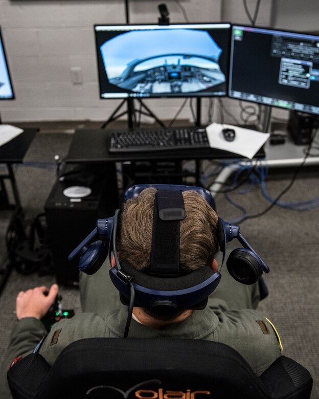 An Euro-NATO Joint Jet Pilot Training Program student pilots uses a virtual reality station at Sheppard Air Force Base, Texas, Dec. 10, 2019. The ENJJPT program allows student pilots access to the Spark Cell at Sheppard. The Spark Cell incorporates virtual and augmented reality into the student pilots training. They are allowed to check out headsets or schedule time to use the stations to continue their training without having to get into an actual plane. (U.S. Air Force photo by Senior Airman Pedro Tenorio)