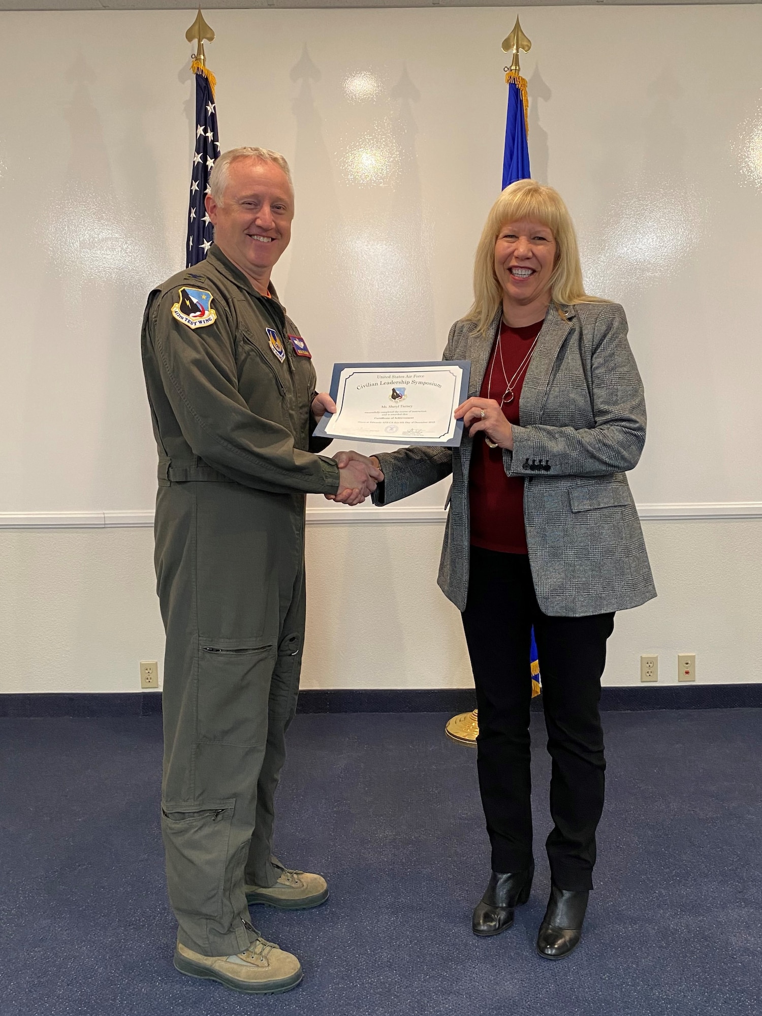 Sheryl Tierney, Engineering Development Office Chief, and Col. Kirk Reagan, 412th Test Wing Vice Commander, pose for a photo during her graduation ceremony from the first ever Civilian Leadership School at Edwards Air Force Base, California. (Courtesy photo)