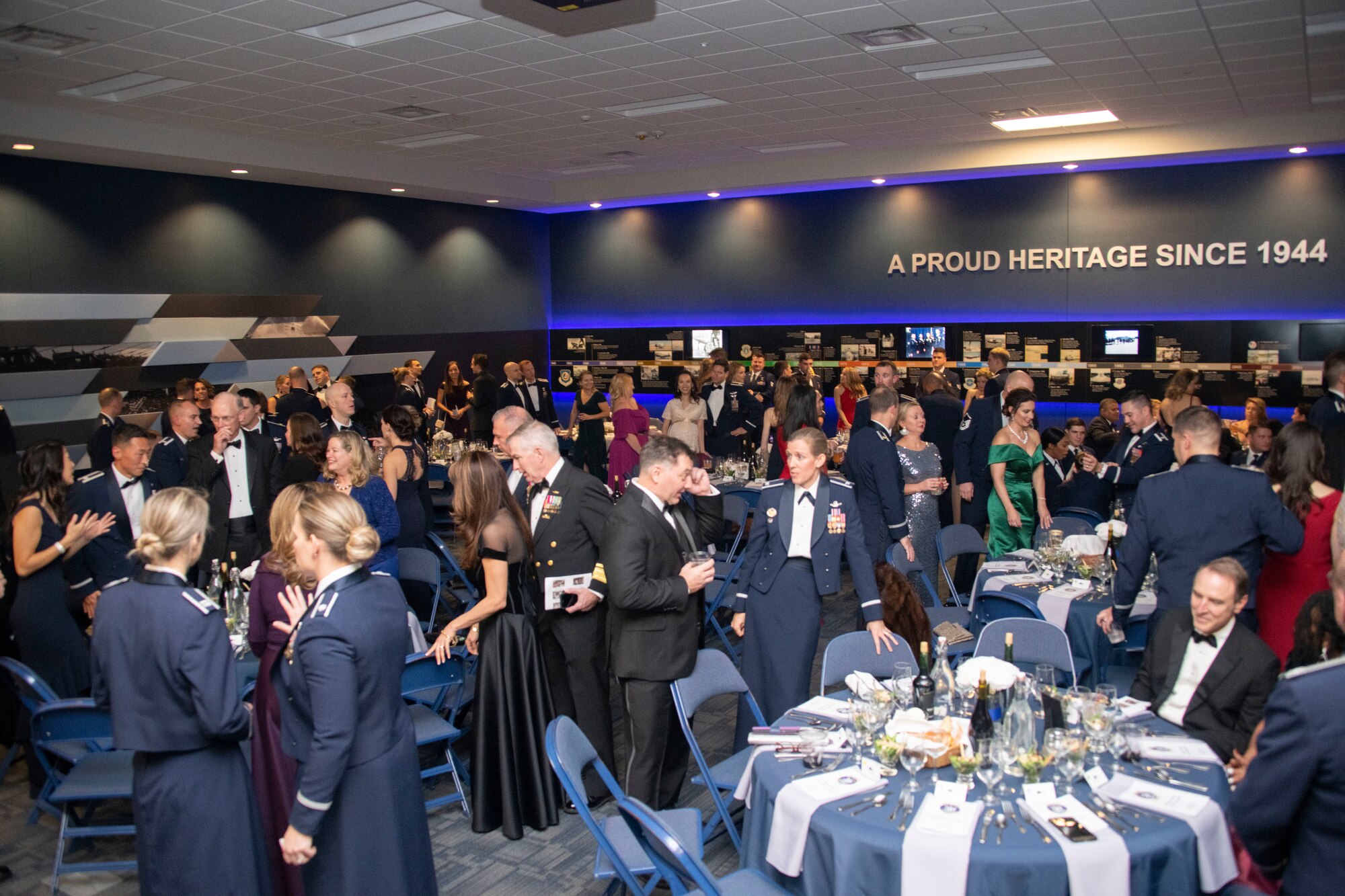 Guests mingle during the 1st Helicopter Squadron's 50th anniversary gala at Joint Base Andrews, Md., Dec. 6, 2019.