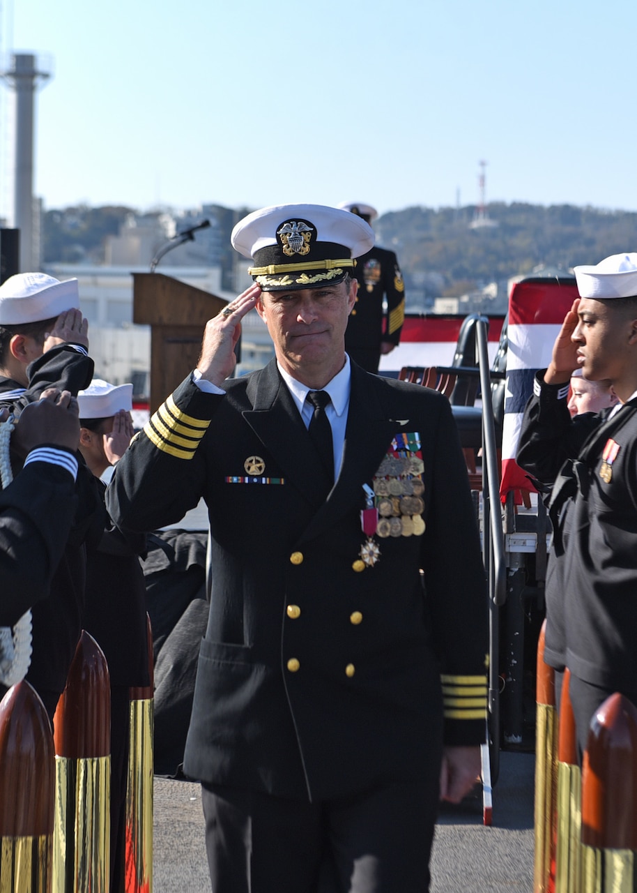 YOKOSUKA, Japan (Dec. 12, 2019) Outgoing Commanding Officer Capt. Eric J. Anduze, from Manati, Puerto Rico, proceeds through sideboys during the U.S. 7th Fleet flagship USS Blue Ridge (LCC 19) change of command ceremony. Capt. Craig C. Sicola, of Dallas, relieved Anduze, from Manati, Puerto Rico, as the ship’s commanding officer. Blue Ridge, part of Expeditionary Strike Group 7, is the oldest operational ship in the Navy and, as 7th Fleet command ship, actively works to foster relationships with allies and partners in support of security and stability within the Indo-Pacific Region.