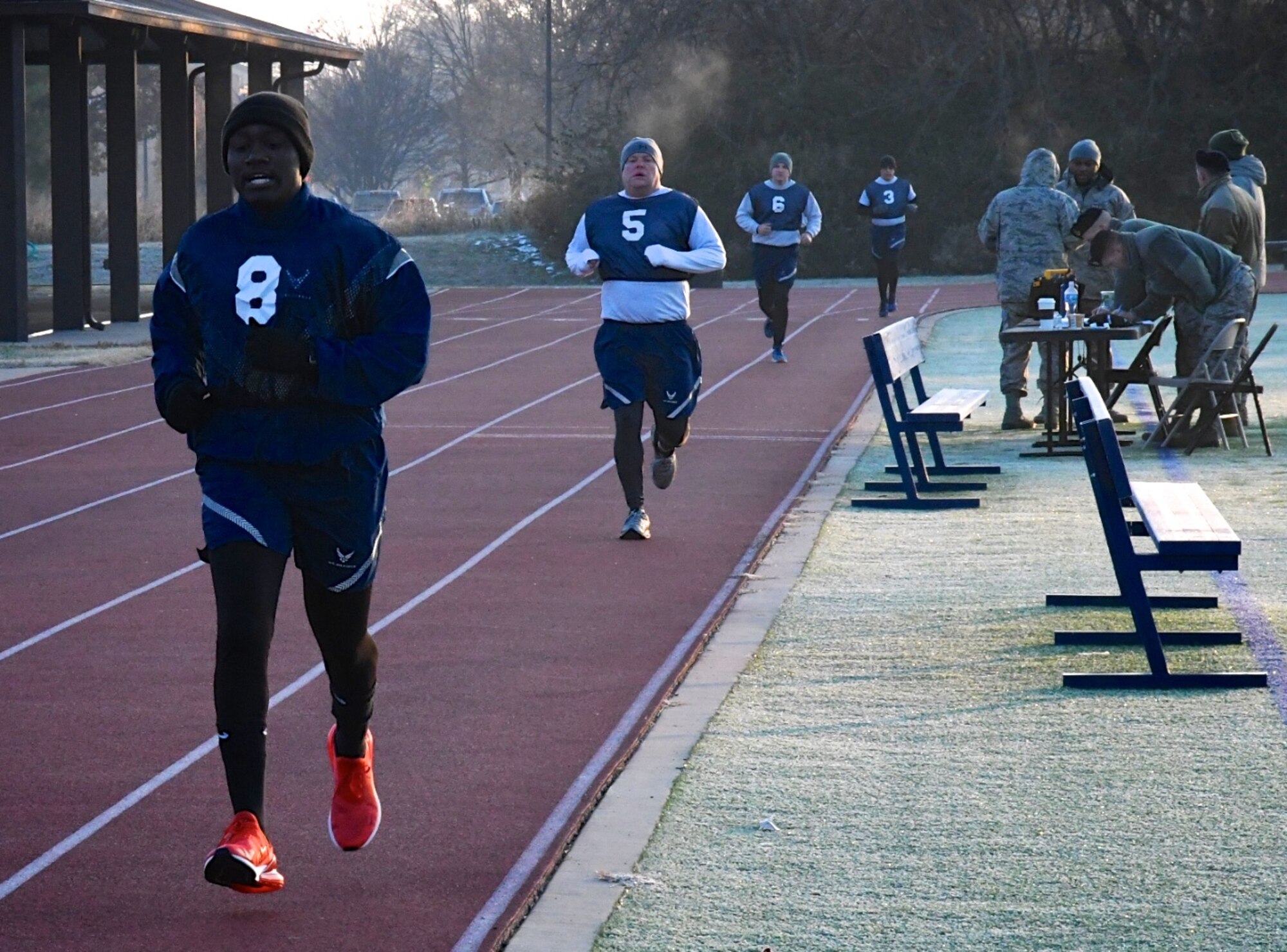Airmen of the Air Force Reserve Command in Illinois complete lap three of six recently.  These 932nd Airlift Wing Citizen Airmen reservists performed the 1.5 mile run as part of the Air Force fitness assessment November 16, 2019, at Scott Air Force Base, Illinois. The weather was a bit chilly at 6:30 a.m., but winds were calm and pleasantly warmed up once the sun rose . Reservists from more than 30 states come to train each month at the Illinois C-40C unit known among reserve units as the "Gateway Wing". Fitness test also include pushups, sit-ups and height and weight measurements. Staying fit throughout the year helps keep Airmen ready for any future challenges.  (U.S. Air Force photo by Lt. Col. Stan Paregien)