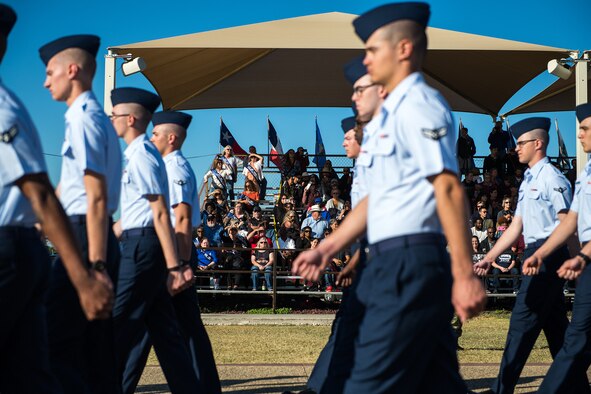 The women of flight W039, 3707th Squadron, of 1979, and their families, attend the U.S. Air Force basic military training graduation parade, Oct. 18, 2019, at Joint Base San Antonio-Lackland, Texas.