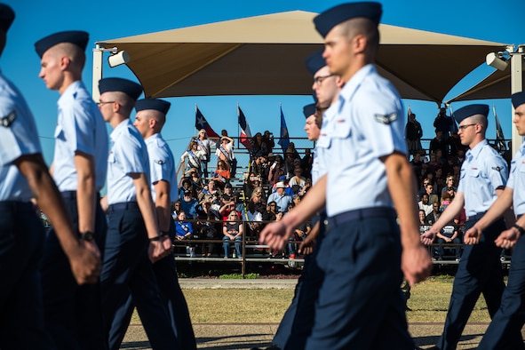 The women of flight W039, 3707th Squadron, of 1979, and their families, attend the U.S. Air Force basic military training graduation parade, Oct. 18, 2019, at Joint Base San Antonio-Lackland, Texas.