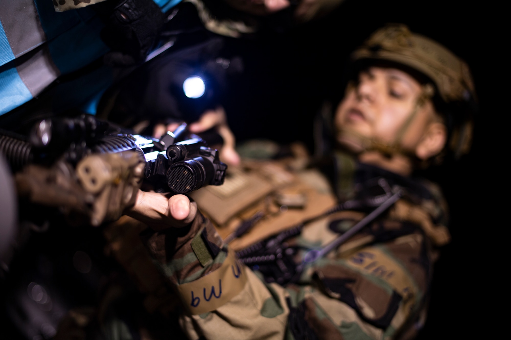 U.S. Air Force Airmen assigned to the 569th U.S. Forces Police Squadron perform clearing procedures before a simulated ground attack during exercise Operation Varsity 19-04 at Kapaun Air Station, Germany, Dec. 11, 2019. The simulation demonstrated the use of de-escalation tactics and tested security forces response to enemy fire. (U.S. Air Force photo by Staff Sgt. Devin Boyer)