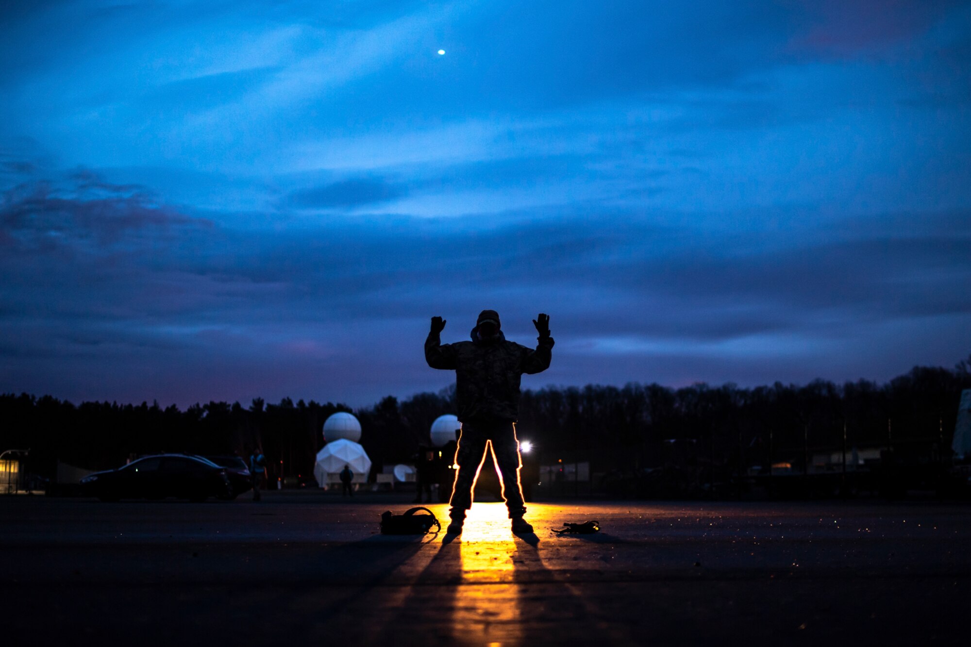 U.S. Air Force Airmen assigned to the 569th U.S. Forces Police Squadron perform de-escalation tactics on an adversary during a simulated ground attack as part of exercise Operation Varsity 19-04 at Kapaun Air Station, Germany, Dec. 11, 2019. Security forces tested their ability to control a hostile situation. (U.S. Air Force photo by Staff Sgt. Devin Boyer)