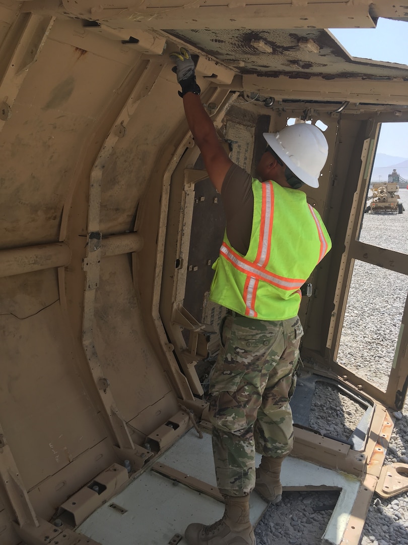 After flipping the vehicle the inspection for contraband by Navy Petty Officer Second Class Jhunar Medenilla only finds only a partial ammunition link and one AA battery.