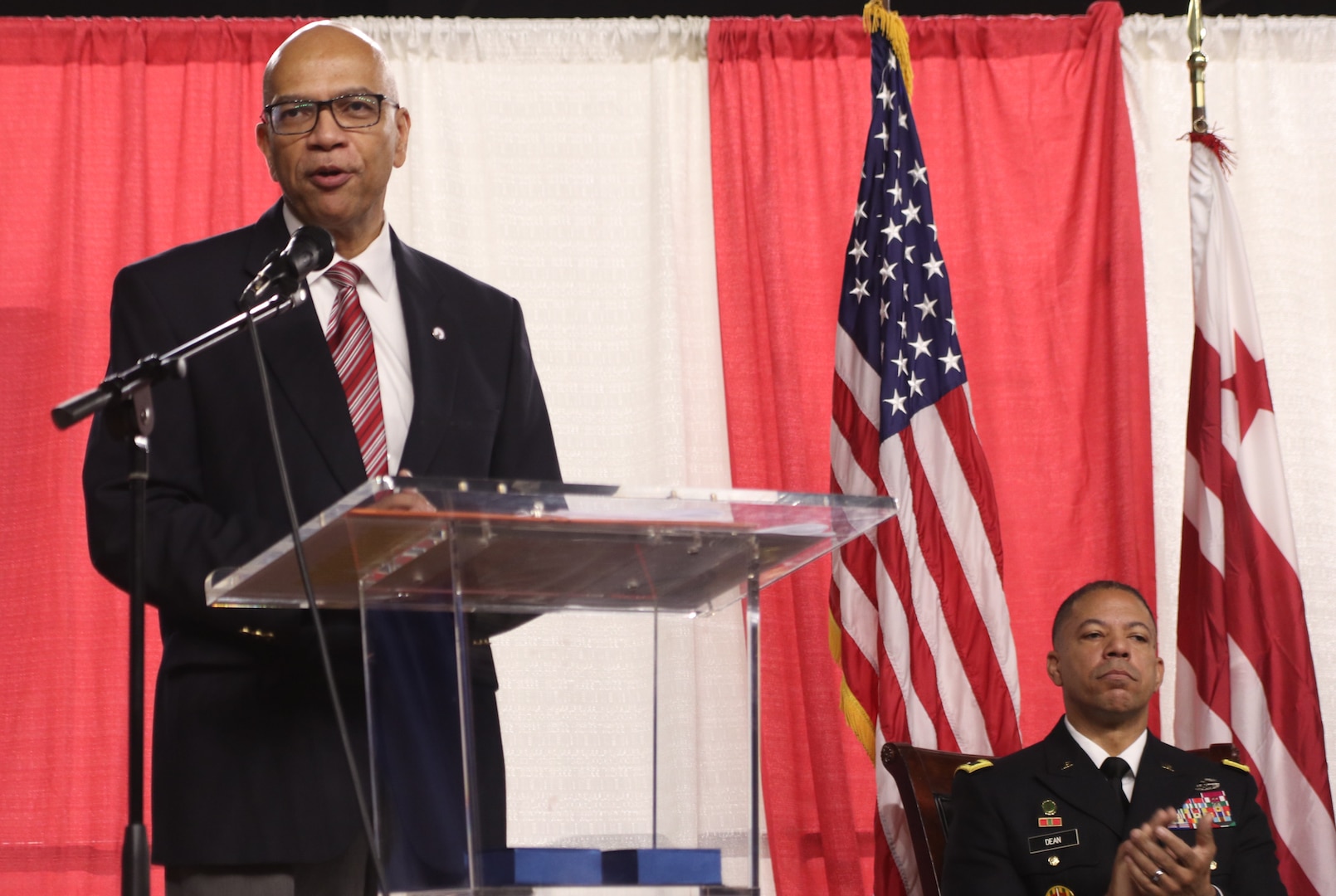 Raynald Blackwell, Capital Guardian Youth Challenge Academy Director, addresses cadets graduating from the Capital Guardian Youth Challenge Academy at the District of Columbia National Guard's Armory Dec. 10. (Photo by Sgt. John Stephens, District of Columbia Army National Guard 715th Public Affairs Detachment)