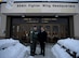 U.S. Air Force Col. Benjamin Bishop, 354th Fighter Wing commander, and Honorable John Rood, Under Secretary of Defense for Policy, pose for a photo outside of Amber Hall on Eielson AFB, AK, Dec. 9, 2019.