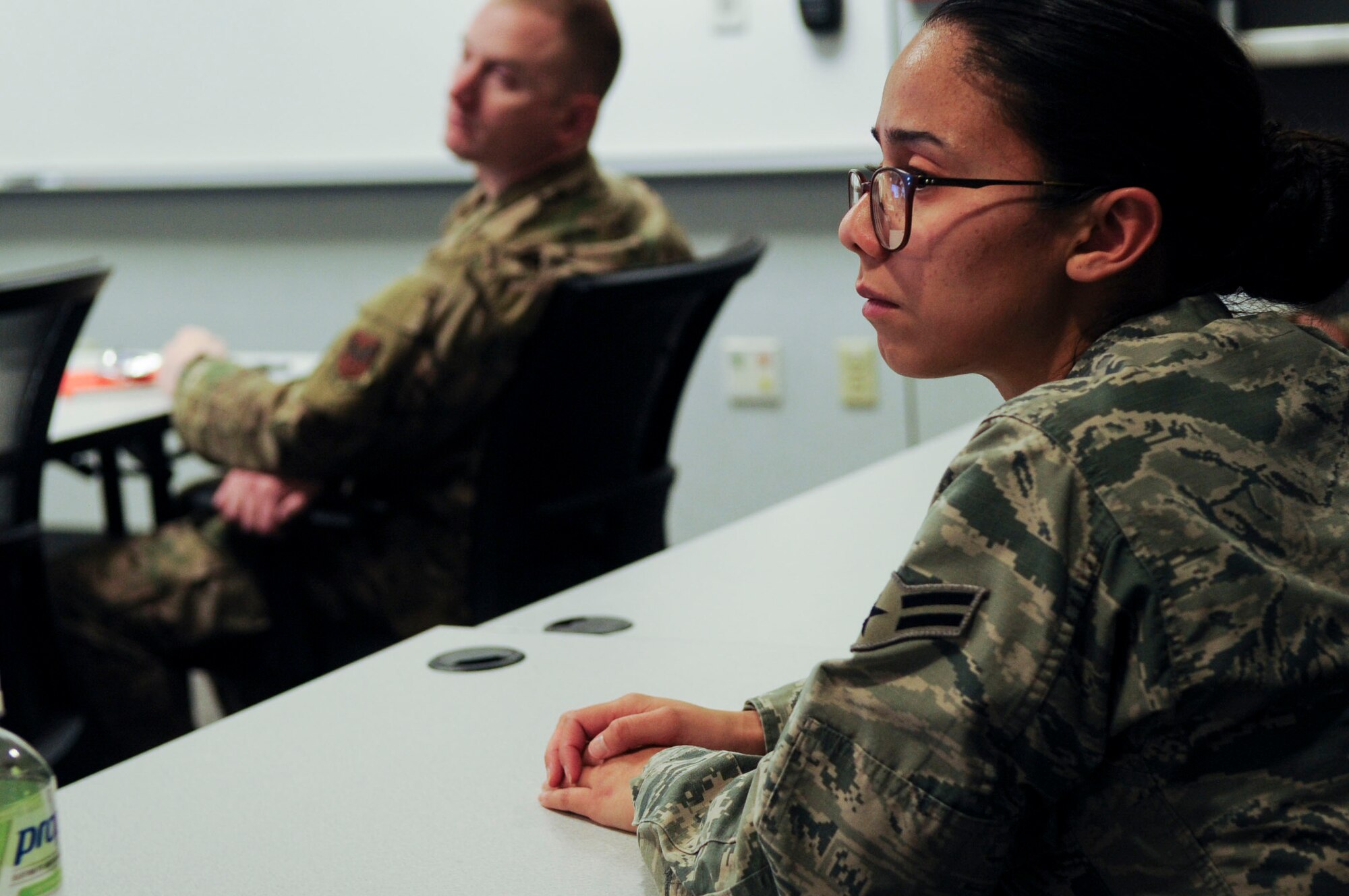 Airman 1st Class Mesa Jewels, Geospatial and Signatures Intelligence Squadron geospatial analyst, listens to a briefing during a First Sergeant’s Panel on the progressive discipline model at Wright-Patterson Air Force Base, Ohio, Dec. 11, 2019. Jewels stated that she attended the panel so she could gain firsthand knowledge on specific disciplinary structures frequently used. (U.S. Air Force photo by Staff Sgt. Seth Stang)