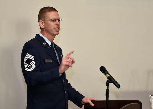 Chief Master Sgt. Jon Neidigh, 47th Operations Support Squadron radar approach control chief controller at Laughlin Air Force Base, speaks to the graduates of Airman Leadership School Class 20-A during the their ceremony at the event center on Goodfellow Air Force Base, Texas, December 12, 2019. Neidigh spoke about how important it is for the graduates to not be afraid to make mistakes and learn from them. (U.S. Air Force photo by Airman 1st Class Robyn Hunsinger)