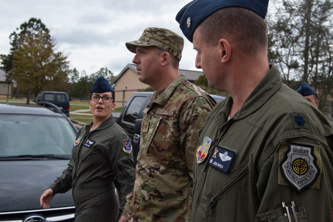 Photo of an Airman speaking to the wing commander during a 71st RQS tour