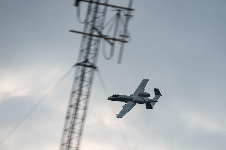 Photo of an A-10C Thunderbolt II completing a pass.