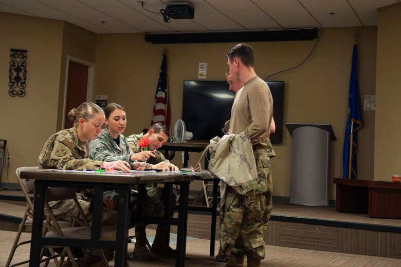 A photo of Airmen signing into the mass flu line