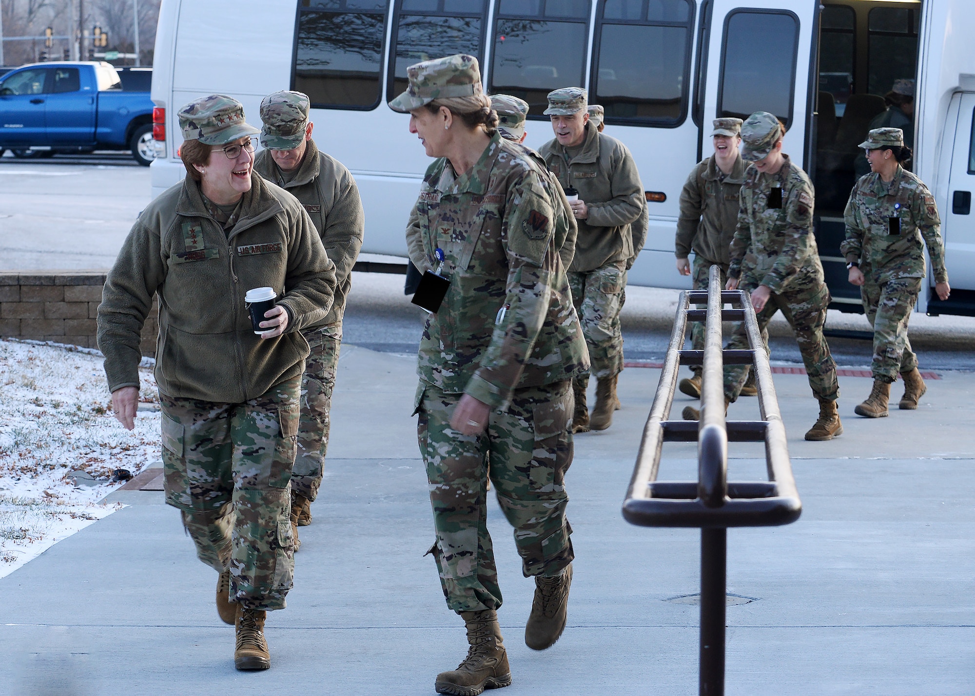 Lt. Gen. Dorothy Hogg, Air Force Surgeon General, speaks to Col. Julie Ostrand, 55th Medical Group, during her visit to the Erhling Berquist Clinic at Offutt Air Force Base, Nebraska Dec. 10, 2019. During the visit Hogg toured the Ehrling Bergquist Clinic to learn what innovative ways the 55th Medical Group was accomplishing their mission. The 55th Medical Group came under the Defense Health Agency in Oct. 1, 2019.
