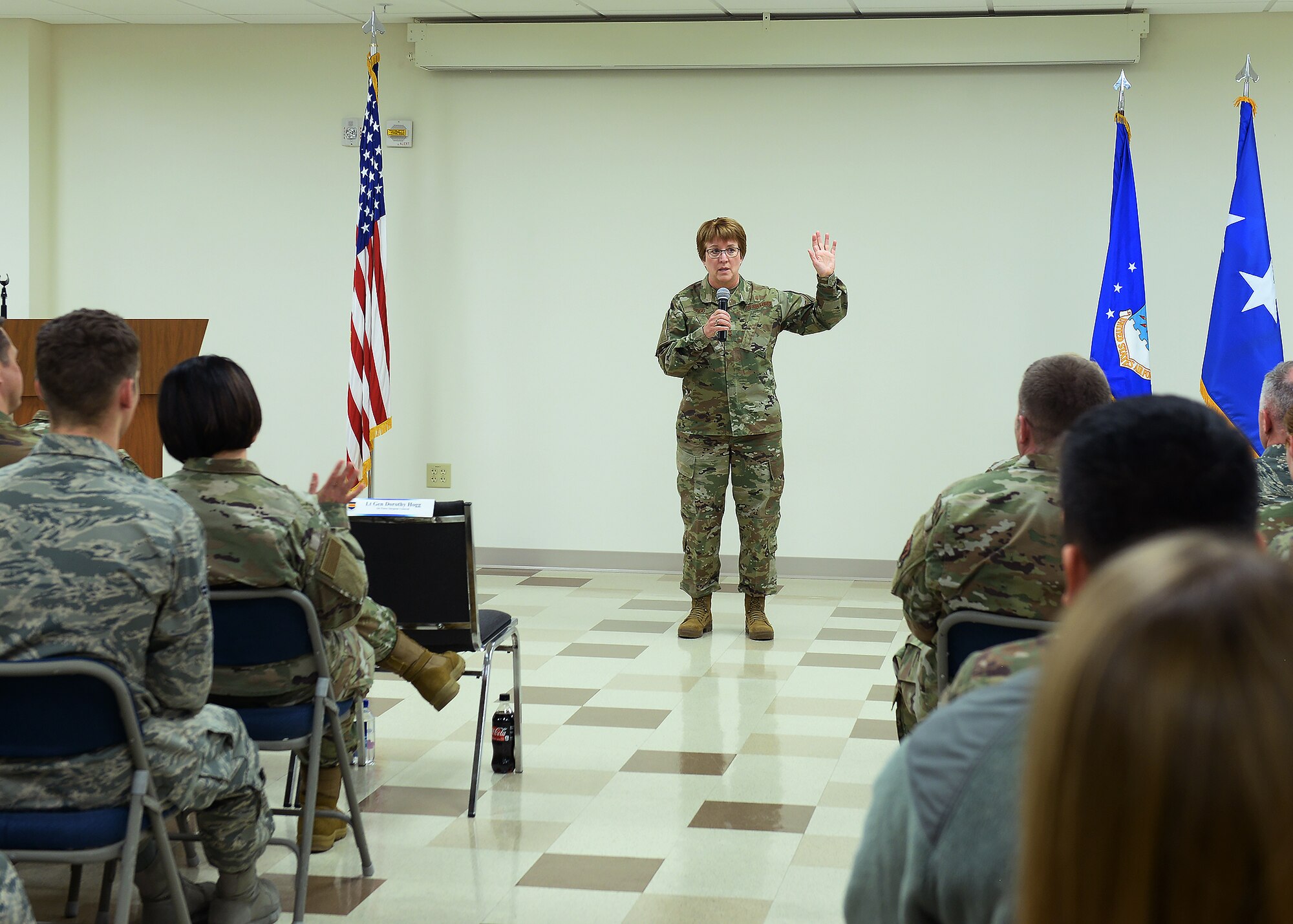 Lt. Gen. Dorothy Hogg, Air Force Surgeon General, speaks to 55th Medical Group members during an all call inside Erhling Berquist Clinic assembly hall at Offutt Air Force Base, Nebraska. Hogg met with various flights throughout the 55th MDG. Hogg was able to meet team Offutt member and learned what makes the EBC work so efficiently. Being disruptive innovators and out of the box thinkers was a main component of Hogg’s message to the mighty medics.
