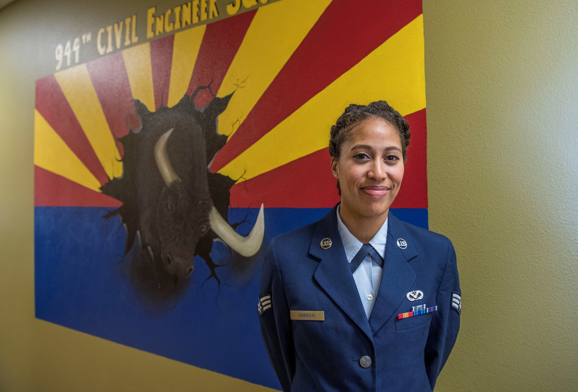 As an accomplished artist, Simmons saw an opportunity to share her abilities with her squadron. Through crafting a mural depicting the squadron heritage and logo, Simmons is credited with not only boosting morale, but helping to sustain the squadron’s heritage.