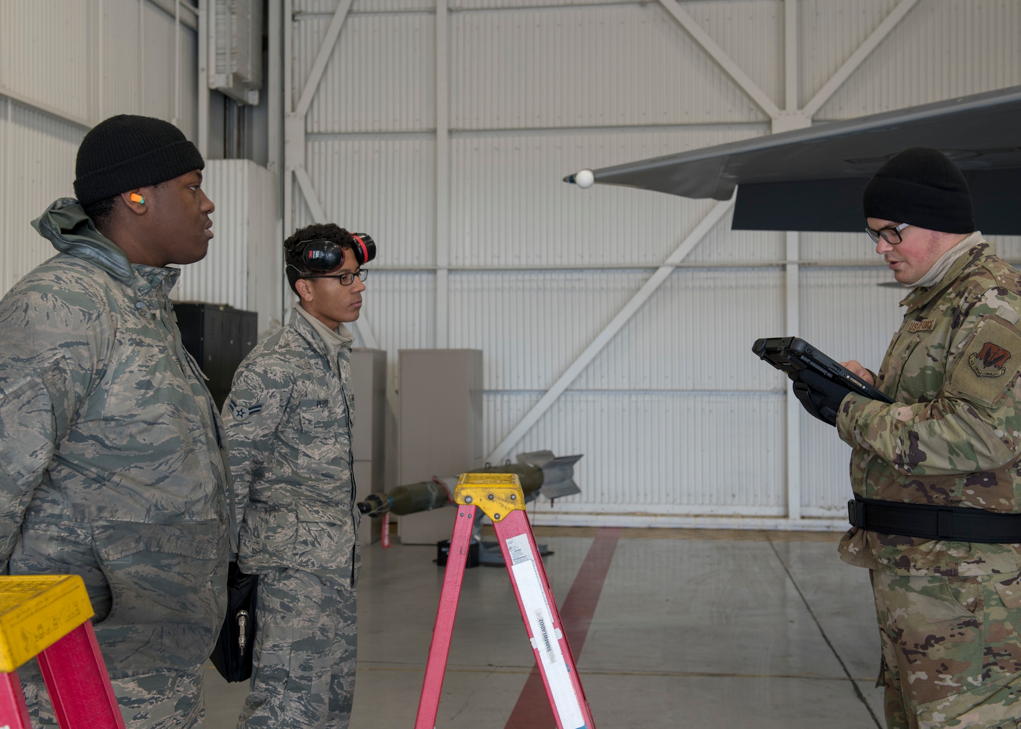 Weapons load crew members train to earn initial certification