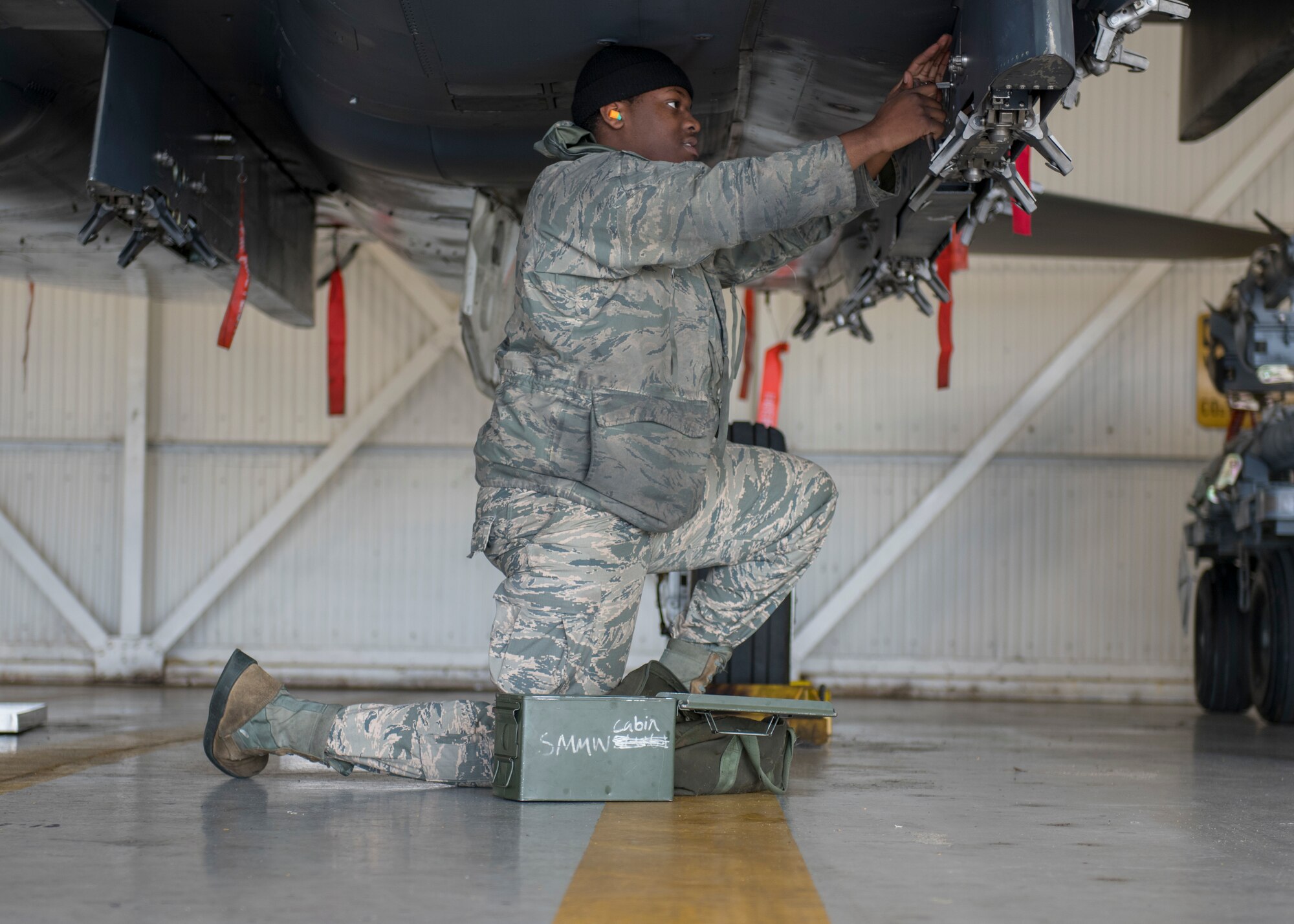 Weapons load crew members train to earn initial certification