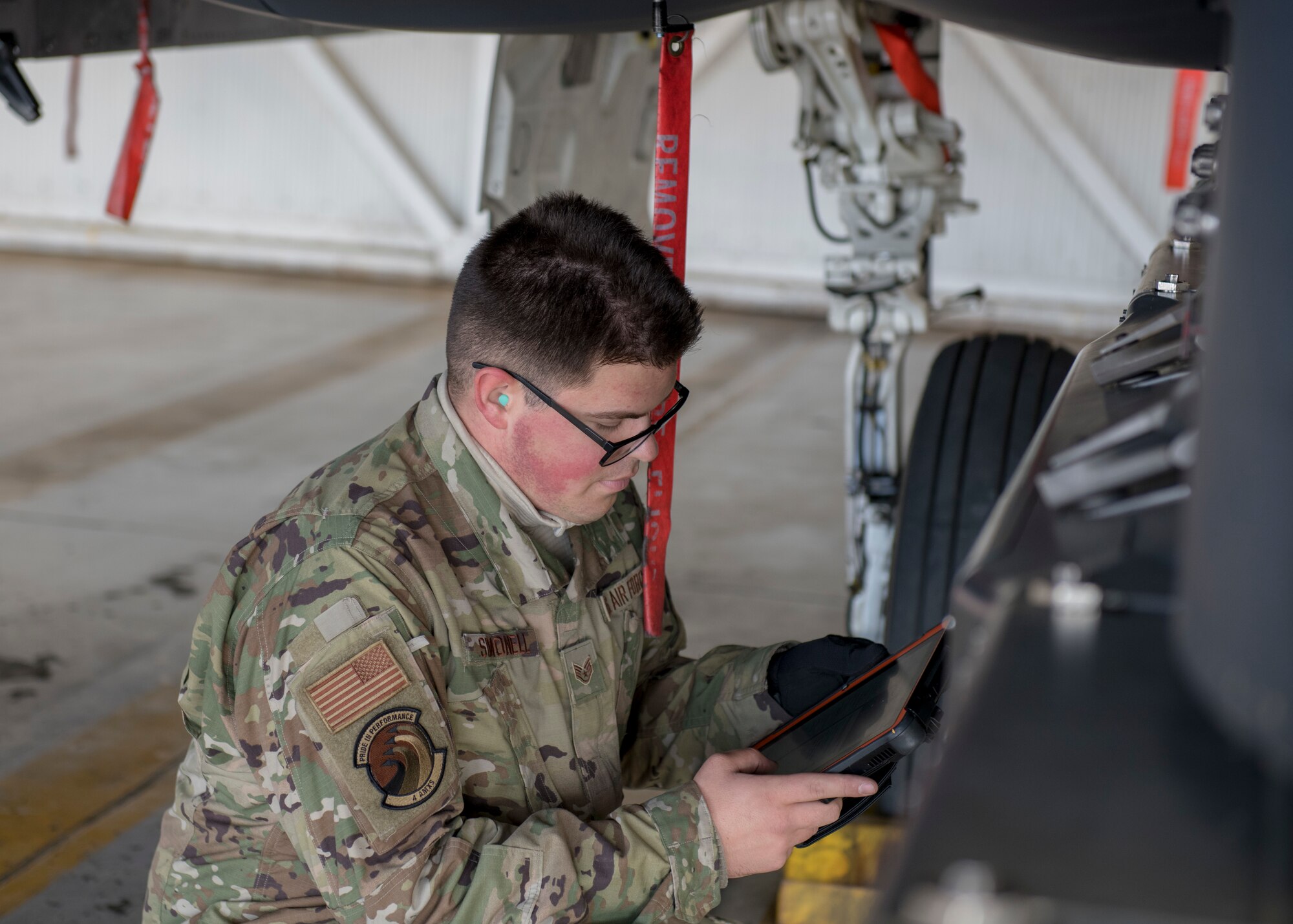 Weapons load crew members train to earn initial certification