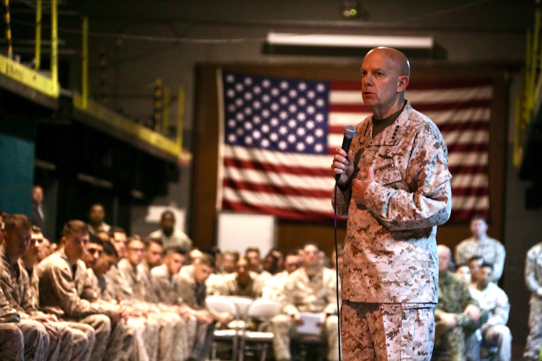 Commandant of the Marine Corps Gen. David H. Berger speaks to Marines and Sailors during a town hall while visiting Bahrain, Dec. 10, 2019.  Gen. Berger spoke about his expectations for the force and thanked Marines for their continued success. He also met with Marine Corps leaders to discuss current and future partnerships across the region. This is Gen. Berger’s first visit to the CENTCOM area of operation as Commandant.