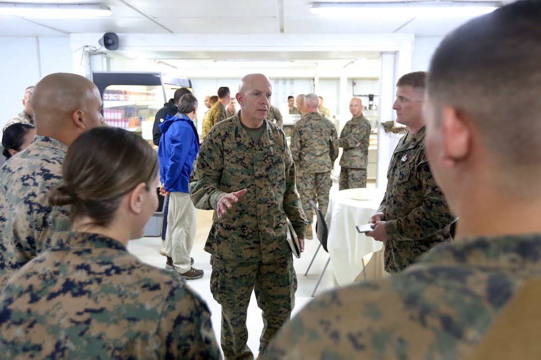 Commandant of the Marine Corps Gen. David H. Berger speaks with Marines after a town hall while visiting Camp Shorab, Helmand Province, Afghanistan, Dec. 12, 2019. Gen. Berger spoke about his expectations for the force and thanked Marines for their continued success. He also met with Marine Corps leaders to discuss current and future partnerships across the region. This is Gen. Berger’s first visit to the CENTCOM area of operation as Commandant.