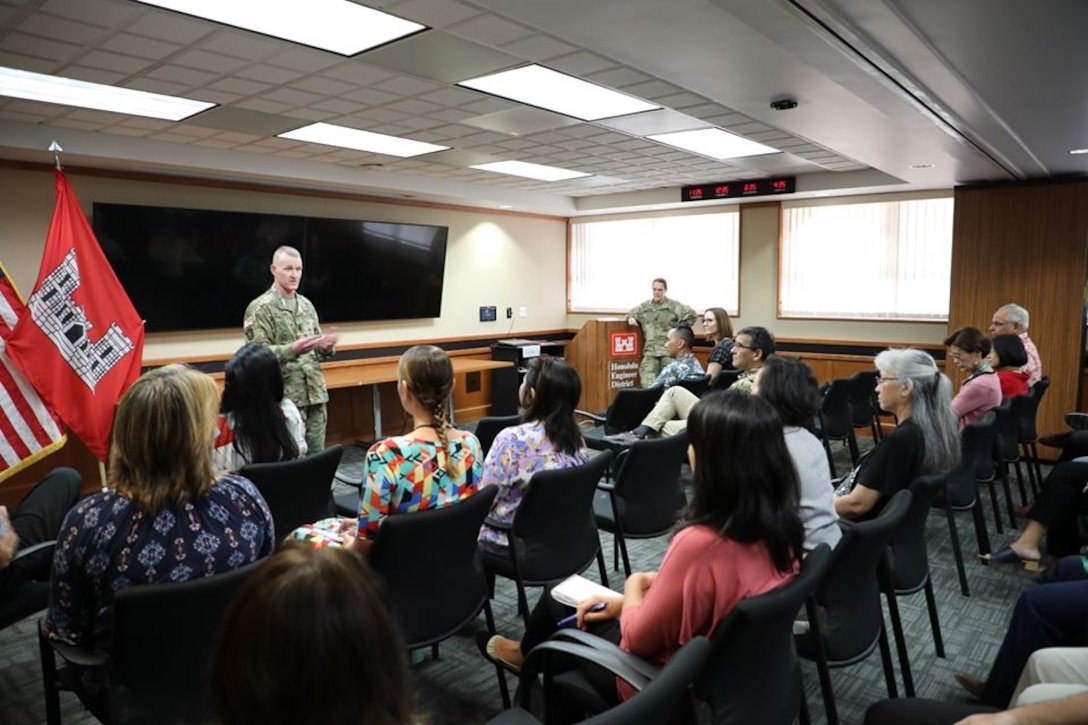 During a mini-town hall Dec. 2, U.S. Army Corps of Engineers Command Sgt. Maj. Bradley Houston discussed forthcoming Revolutionize USACE initiatives with District personnel and later visited District MILCON project sites at Fort Shafter and Schofield Barracks. During the townhall Houston awarded his signature USACE CSM coin to seven District employees for their excellence in delivering the District mission.