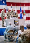 West Virginia National Guard Command Sgt. Maj. Phillip R. Cantrell looks on as Spc. Justin Rood, Col. William "Bill" Crane, and Senior Airman Nikki Cruz cut a ceremonial cake commemorating the 383rd birthday of the National Guard held at Joint Forces Headquarters, Charleston, W.Va., Dec. 13, 2019. More than 120 Guardsmen and guests attended the ceremony to help celebrate the National Guard's birthday. (U.S. Army National Guard photo by Edwin L. Wriston)