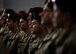 Pararescue Airmen stand lined up at attention.