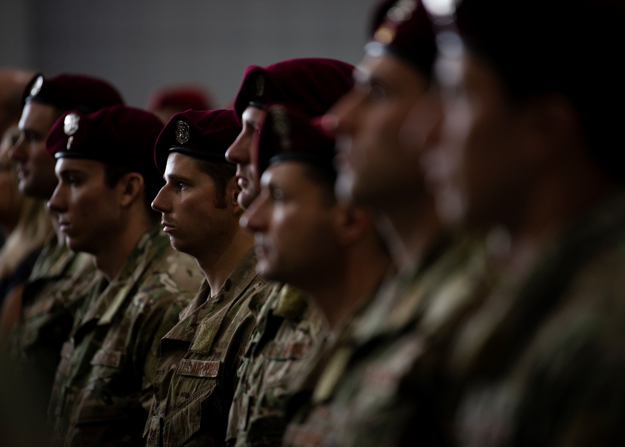 Pararescue Airmen stand lined up at attention.