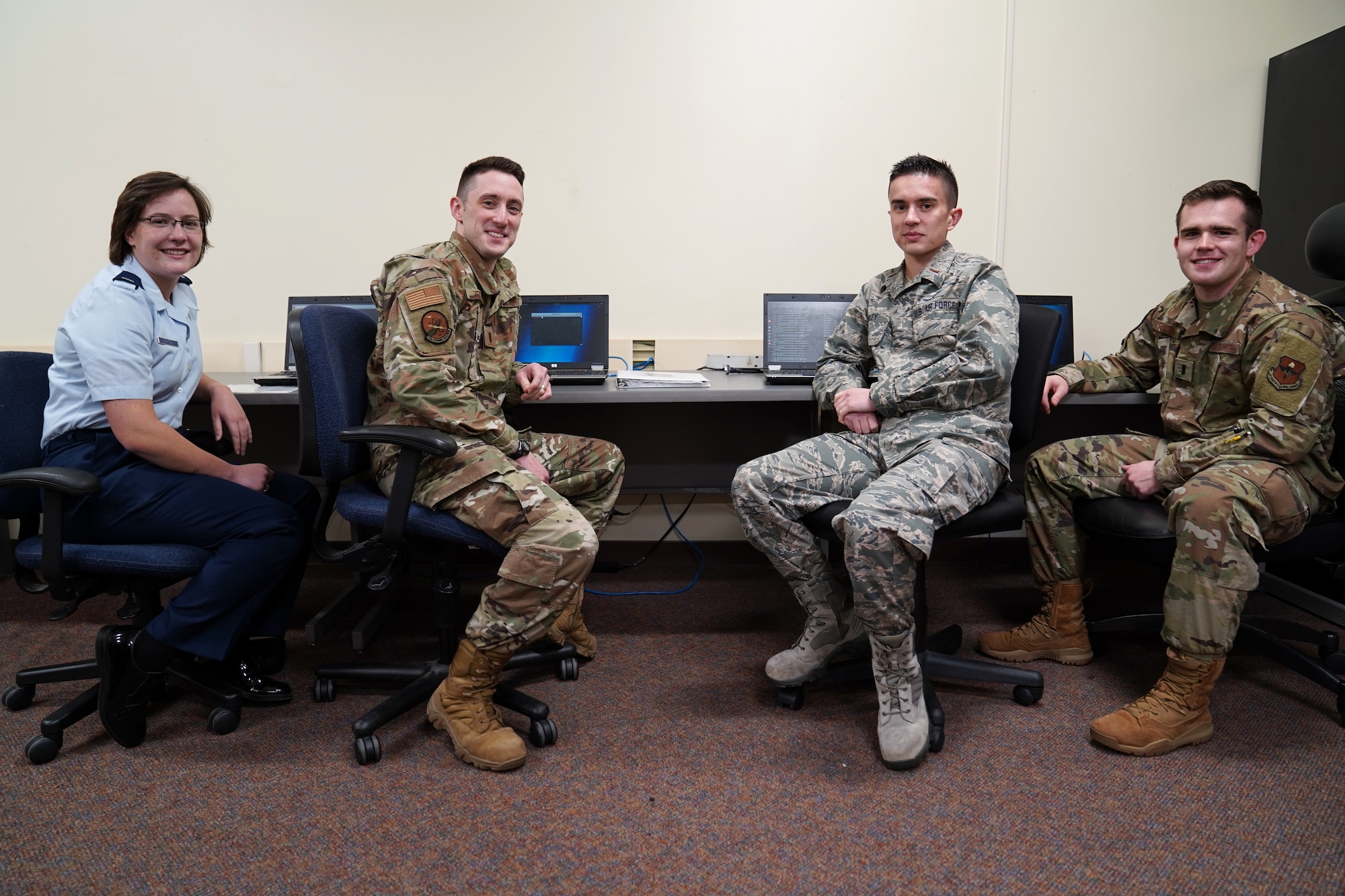 U.S. Air Force Airmen, President's Cybersecurity Cup competition team, pose for a photo inside Stennis Hall at Keesler Air Force Base, Dec. 12, 2019. The competition was initiated by President Donald Trump to strengthen cybersecurity across the nation and Department of Defense. (U.S. Air Force photo by Airman Seth Haddix)