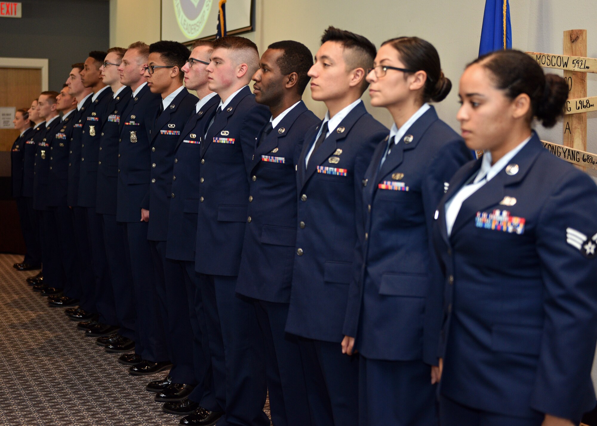 Graduates of Airman Leadership School Class 20-A prepare to sing the Air Force Song during the ALS Graduation ceremony at the event center on Goodfellow Air Force Base, Texas, December 12, 2019. ALS is a four-week course designed to prepare senior airmen to assume supervisory duties. (U.S. Air Force photo by Airman 1st Class Robyn Hunsinger)