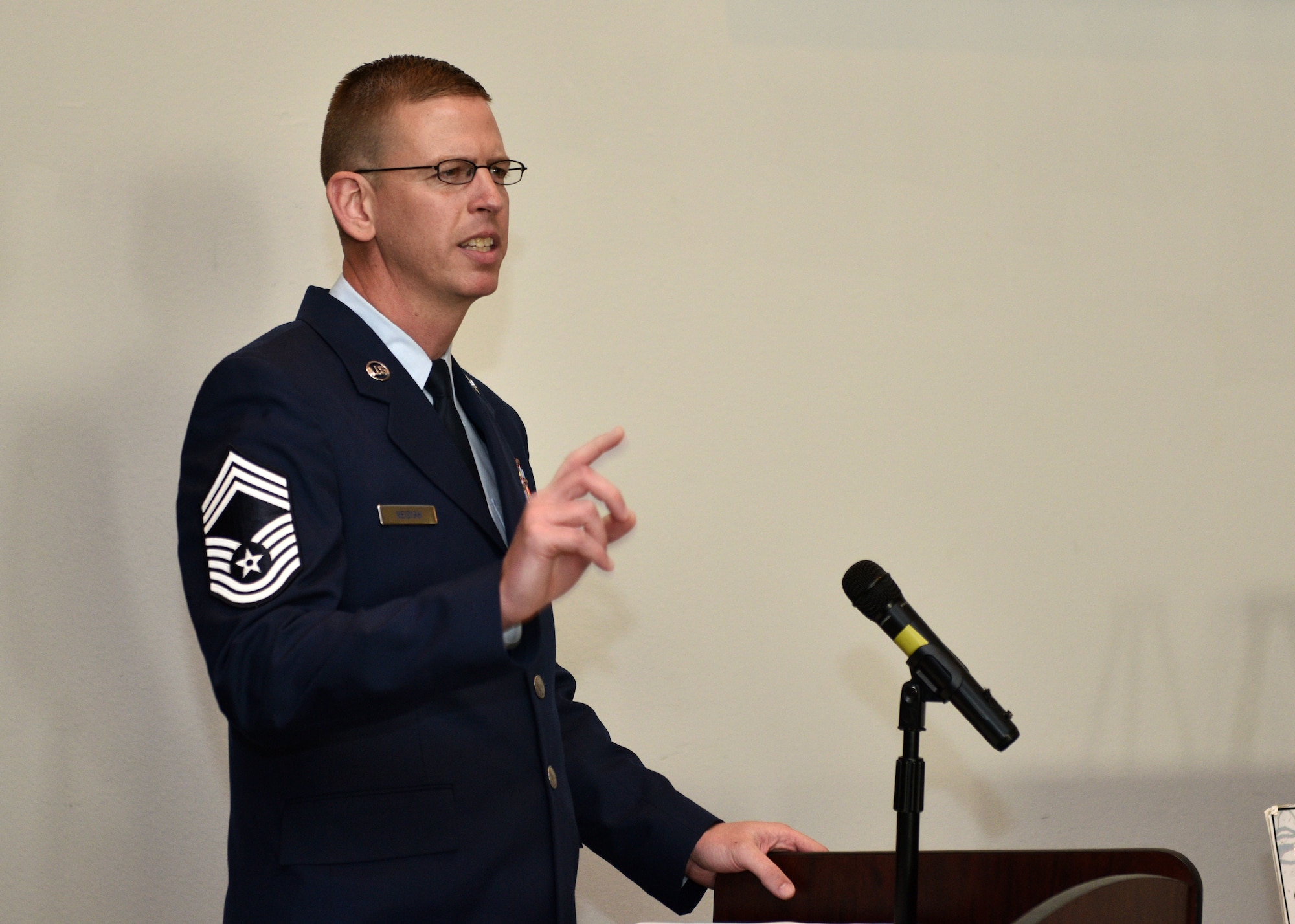 Chief Master Sgt. Jon Neidigh, 47th Operations Support Squadron radar approach control chief controller at Laughlin Air Force Base, speaks to the graduates of Airman Leadership School Class 20-A during the their ceremony at the event center on Goodfellow Air Force Base, Texas, December 12, 2019. Neidigh spoke about how important it is for the graduates to not be afraid to make mistakes and learn from them. (U.S. Air Force photo by Airman 1st Class Robyn Hunsinger)