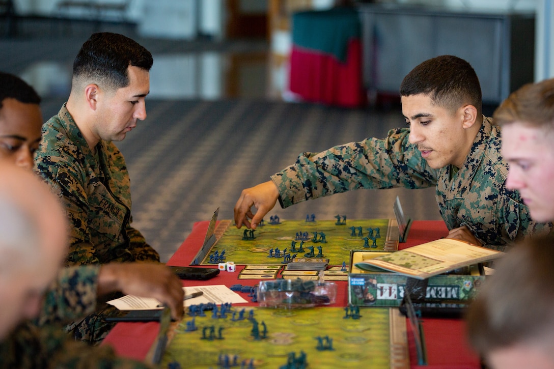 U.S. Marines with 3rd Marine Division play a game of Memoir 44’ on Camp Schwab, Okinawa, Japan, Dec. 10, 2019. Memoir 44’ is a war-themed strategy board game based on historical World War II battles. Wargaming is useful in generating, refining, and assessing concepts, plans, decision alternatives, issues and technologies. It also provides an opportunity to take risks, which is difficult to reproduce in experimentation, exercises or operations. (U.S. Marine Corps photo by Cpl. Timothy Hernandez)