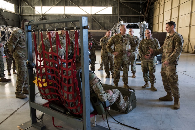 Maj. Gen. John Gordy, U.S. Air Force Expeditionary Center commander, and Chief Master Sgt. Kristopher Berg, USAF EC command chief, examine a High Altitude Airdrop Missions (HAAMS) equipment demonstration Dec. 11, 2019, at Joint Base Charleston, S.C. During their visit, Gordy and Berg toured various facilities across the installation for a behind-the-scenes look at base operations while getting a glimpse of service members in action. The USAF EC is the Air Force’s center of excellence for rapid global mobility and agile combat support training and education. The center also has direct oversight for installation support, contingency response and mission sets within the global mobility enterprise.