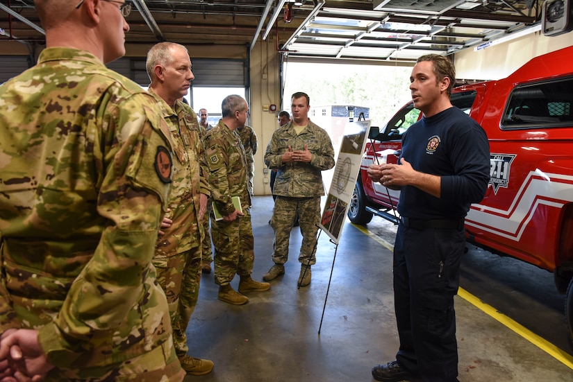 Maj. Gen. John Gordy, U.S. Air Force Expeditionary Center commander, and Chief Master Sgt. Kristopher Berg, USAF EC command chief, learn about the fire department’s mission Dec. 10, 2019, at Joint Base Charleston, S.C. During their visit, Gordy and Berg toured various facilities across the installation for a behind-the-scenes look at base operations while getting a glimpse of service members in action. The USAF EC is the Air Force’s center of excellence for rapid global mobility and agile combat support training and education. The center also has direct oversight for installation support, contingency response and mission sets within the global mobility enterprise.