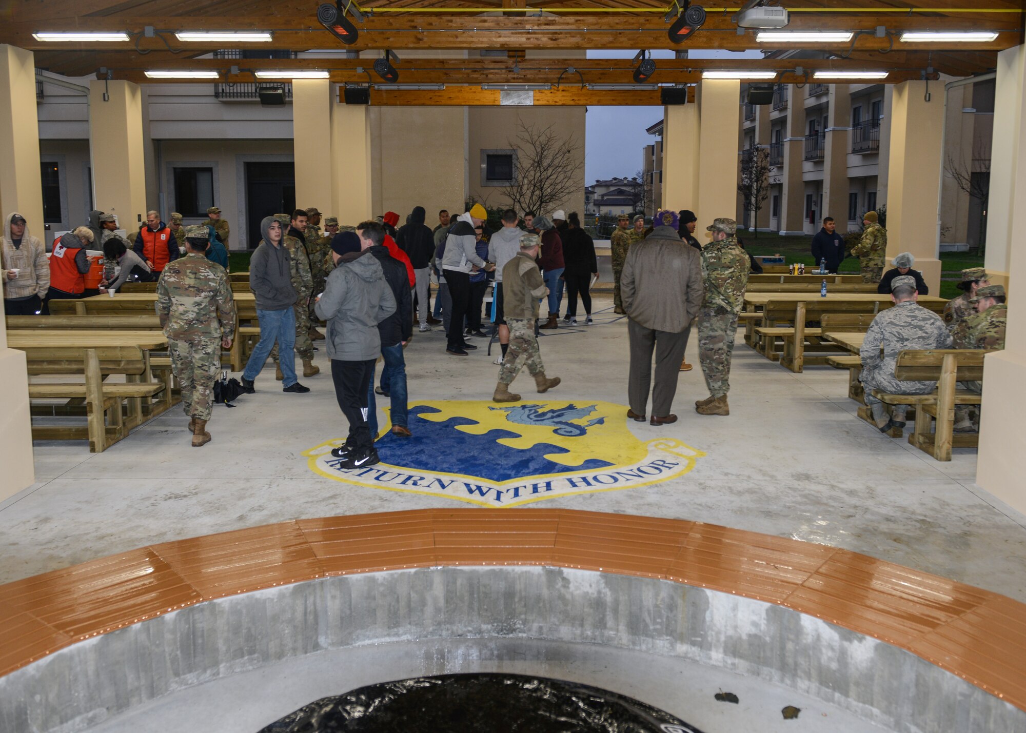 U.S. Air Force Airmen from the 31st Fighter Wing attend a grand opening ceremony for a new dorm pavilion at Aviano Air Base, Italy, Dec. 13, 2019. The construction of the pavilion was in effect for 11 months and was built for dorm Airmen. (U.S. Air Force photo by Airman Thomas S. Keisler IV)