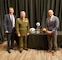 U.S. Marine Corps Gen. Kenneth F. McKenzie Jr., center, the commander of U.S. Central Command, Gus Malzahn, left, the head coach of the Auburn Tigers football team, and Philip John Fleck Jr., the head coach of the Minnesota Golden Gophers, pose for a photo at Raymond James Stadium in Tampa, Florida, Dec. 12, 2019. (U.S. Army photo by CPT Jennifer Cruz)