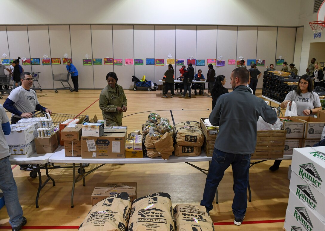 A U.S. Army Soldier browses grocery item options during a holiday food distribution at Joint Base Langley-Eustis, Virginia, Dec. 11, 2019.