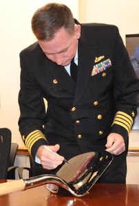 IMAGE: DAHLGREN, Va. (Dec. 12, 2019) – Naval Surface Warfare Center Dahlgren Division (NSWCDD) Commanding Officer Capt. Casey Plew signs a shovel prior to a groundbreaking ceremony for the new Cyber Warfare Engineering Laboratory. Plew broke ground with officials from NSWCDD, Naval Sea Systems Command, and CFM Engineering for the new facility that will provide a robust and flexible software and hardware testing capability for Department of Defense and Navy weapon systems, cyber and network platforms in addition to industrial control systems supporting DoD infrastructure. (Photo by U.S. Navy/Released)