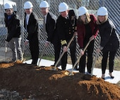 IMAGE: DAHLGREN, Va. (Dec. 12, 2019) – Navy officials, including Naval Surface Warfare Center Dahlgren Division (NSWCDD) leadership, break ground for the command’s new Cyber Warfare Engineering Laboratory, Dec. 12. The facility will bring together the building blocks of existing capabilities into one place to provide a robust and flexible software and hardware testing capability for Department of Defense and Navy weapon systems, cyber and network platforms in addition to industrial control systems supporting DoD infrastructure. From left to right: Christopher Keener, NSWCDD cyber engineer; Darren Barnes, NSWCDD acting technical director; Scott St. Pierre, Enterprise Information Technology officer, Naval Sea Systems Command; Capt. Casey Plew, NSWCDD commanding officer; Shellie Clift, NSWCDD Strategic and Computing Systems Department head; Nancy Fitzgerald, principal, CFM Engineering. (Photo by U.S. Navy/Released)