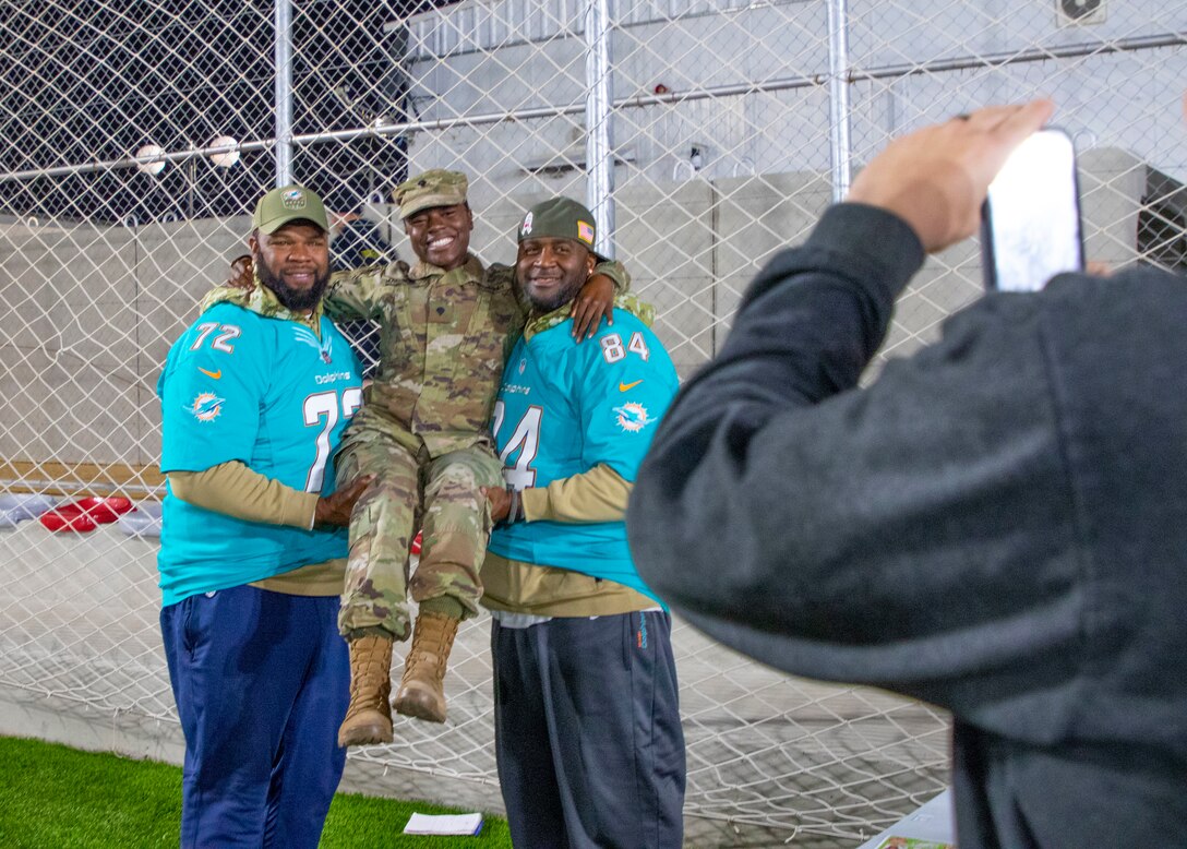 Miami Dolphins spread holiday cheer to troops in Jordan