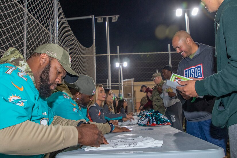 Miami Dolphins spread holiday cheer to troops in Jordan