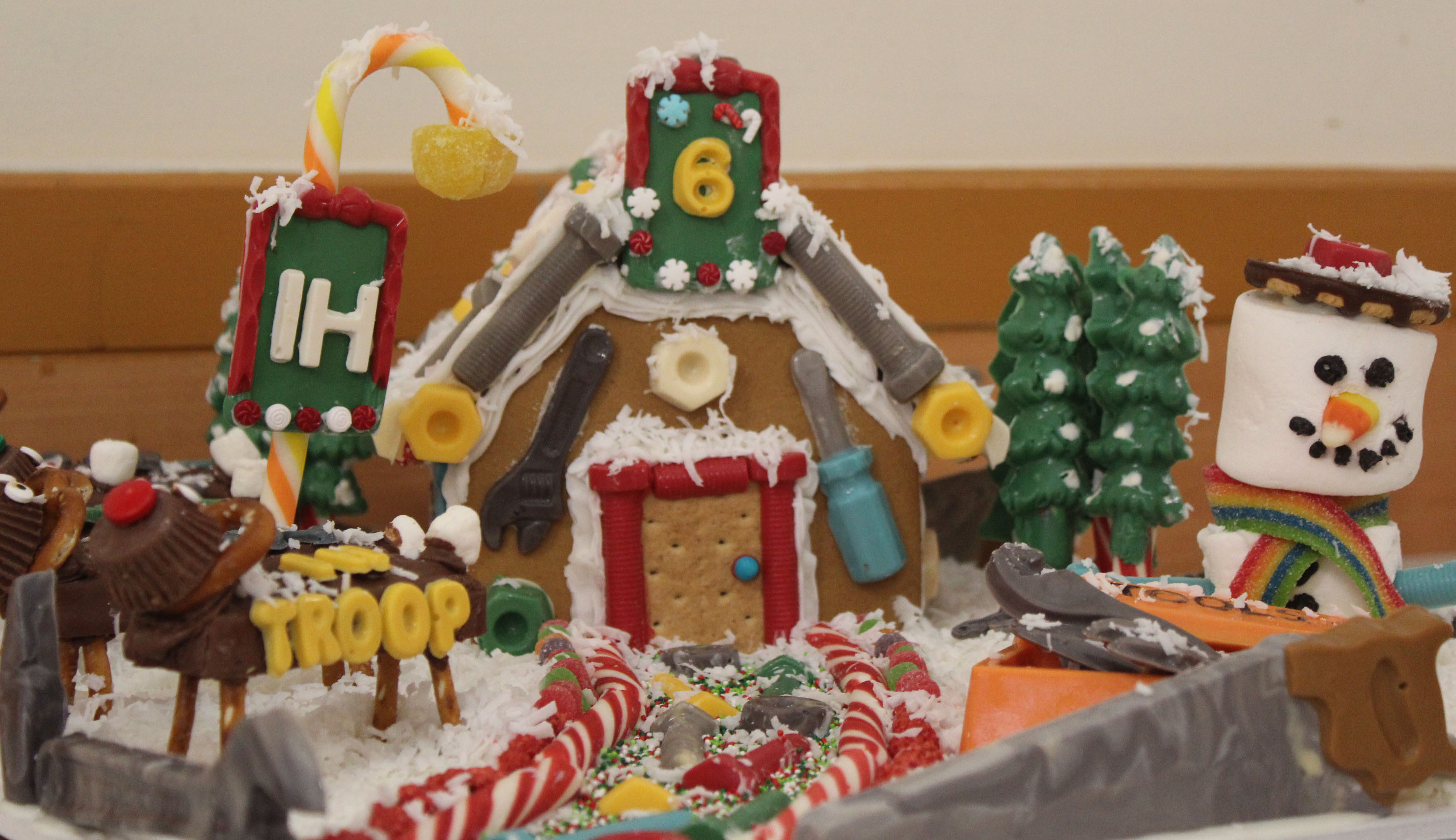 Dla Troop Support Sweeps Gingerbread House Decorating Competition